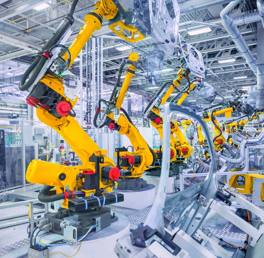 Industrial robots in a factory setting